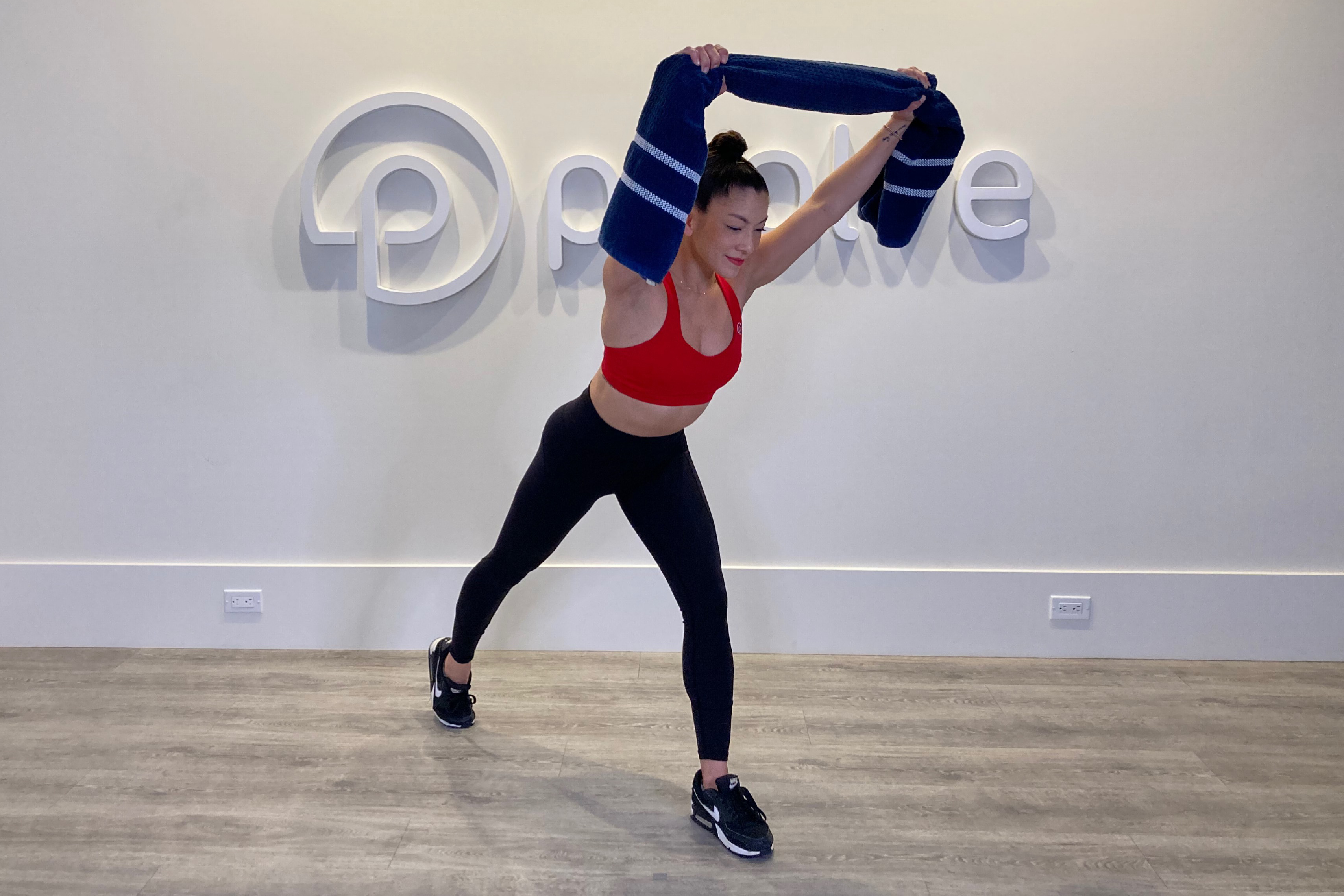 Standing Side Bend with Towel Exercise Demonstration