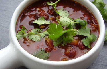Close overhead view of a cup of spicy vegetarian chili