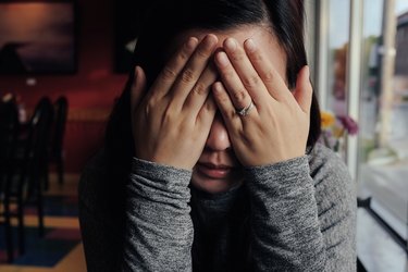 woman crying indoors