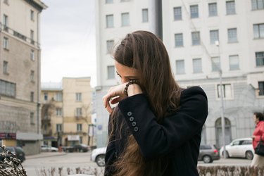 woman crying outdoors