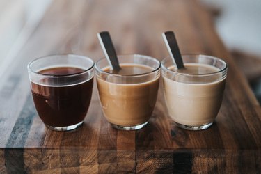 Coffee cups on a wood bar