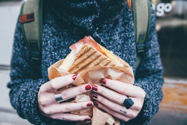 woman eating a sandwich