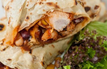Breakfast Burrito  with chicken and beans close-up