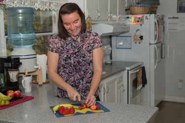 Brittany cuts fruit