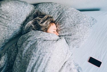 woman sleeping in bed