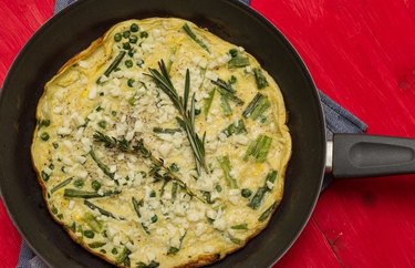 cast iron skillet recipes Spring Frittata With Artichokes, Peas, Green Onions and Goat Cheese