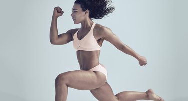 woman running in the athleta bra