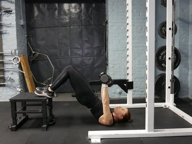 Proper form for heel-elevated hip thrust decline.