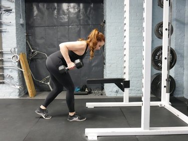 Proper form for staggered deadlift to bent-over row.