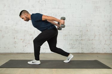 Mike Donavanik demonstrates a lunge with triceps extension