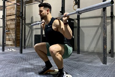 Mathew Forzaglia performing heel elevated squat.