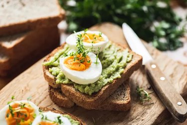 healthy breakfast recipe of hard-boiled egg on avocado toast
