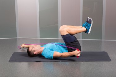 Man Demonstrating How to Do Supine 3-Month Diagonals