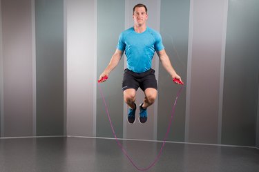 Man Demonstrating How to Do High-Knee Jumps