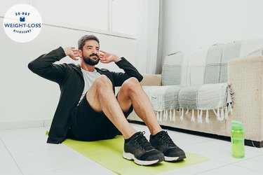 Man working out in his home