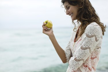 woman eating an apple