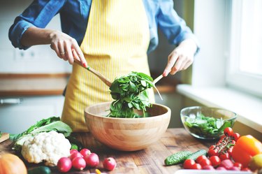 woman making a salad