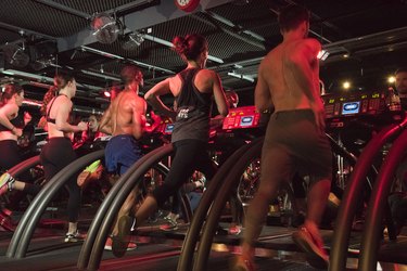 People running on the treadmill during a Barry's Bootcamp workout