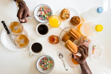 Breakfast spread with baked goods and cereal