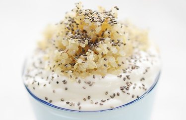 skin-boosting breakfast of Nutty Chia Breakfast Crunch in a glass over a white background