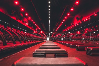 Treadmills and strength training stations at a Barry's Bootcamp workout class