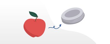 A small apple compared to a Mason jar lid