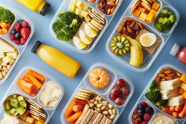 Flat Lay of lunches neatly organized in portion control tupperware containers