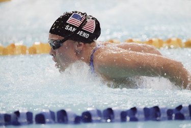 Olympic gold medalist Kaitlin Sandeno swimming in pool
