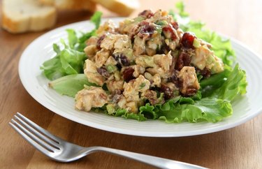 Chicken salad with cherries on a bed of lettuce