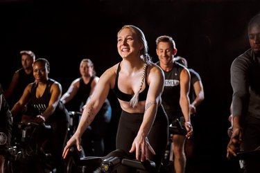 Riders in a SoulCycle workout class.