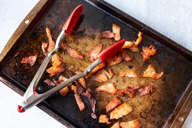 smoked salmon bacon on a baking sheet