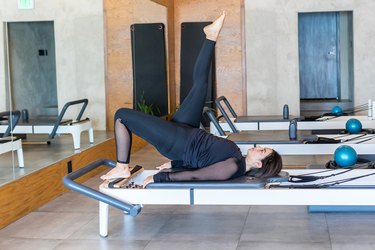 woman doing Pilates to help with running