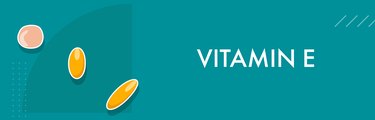 vitamin E pills on teal background