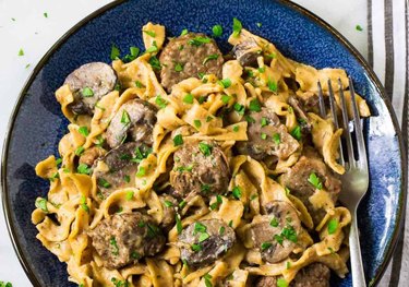 Bowl of beef and noodles for beef stroganoff.