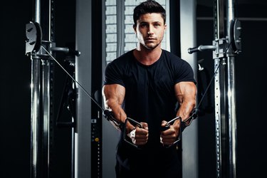 Bodybuilder Training In The Gym Crossover