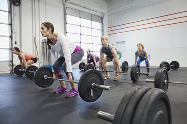 gym class practicing deadlifts