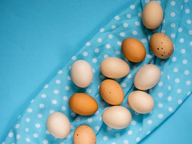 Eggs on a blue background, close-up.