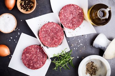 Fresh minced meat, burger steak cutlets ready to prepare