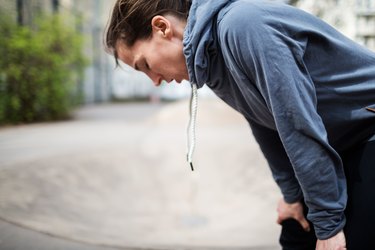 Exhausted sports woman