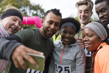 Friend runners taking selfie at charity run