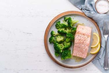 Steam salmon, broccoli, paleo, keto, lshf or dash diet. Mediterranean food. Clean eating, balanced