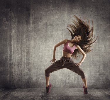 Fitness Sport Dance, Woman Dancer Flying Hair Dancing on Concrete