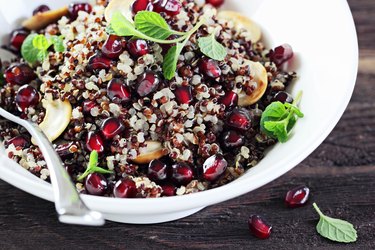 Quinoa salad with pomegranate and nuts.Superfoods concept