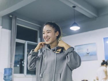 portrait of young female dancing in studio