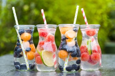 Carafes of miscellaneous fruit infused water
