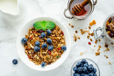 Bowl of homemade granola with yogurt