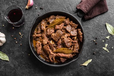 Beef Meat Stew in bowl on black table