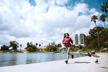 Woman Exercising In Los Angeles City Park