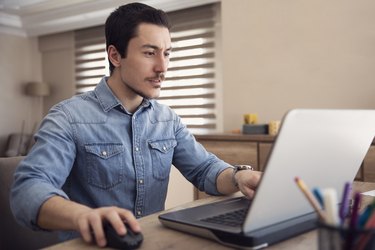 Young Man Working from Home