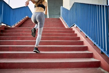 Woman running upstairs